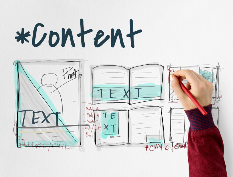 Hand drawing a layout with a red pencil, showing mocked-up book pages and text boxes. The word "Content" is written prominently above.